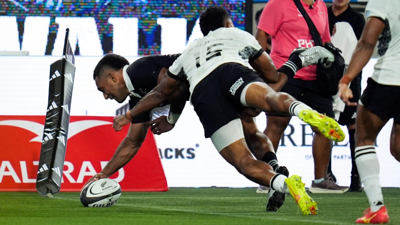 All Black Sevu Reece scores against Fiji.