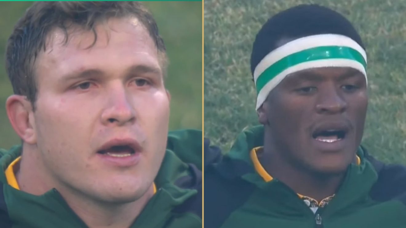 Springboks prop Jan-Hendrik Wessels and flanker Phepsi Buthlezi signing the anthem before the match against Portugal.