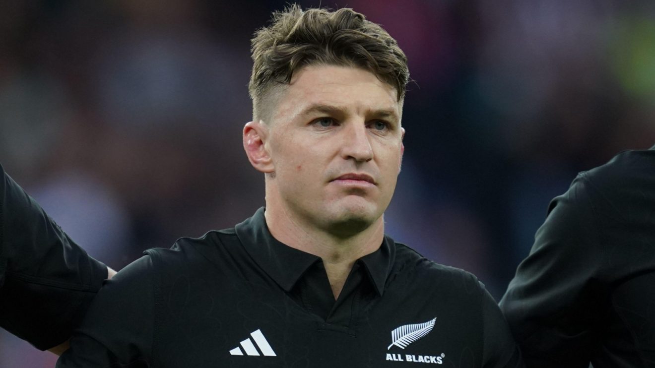 All Black Beauden Barrett looks on.