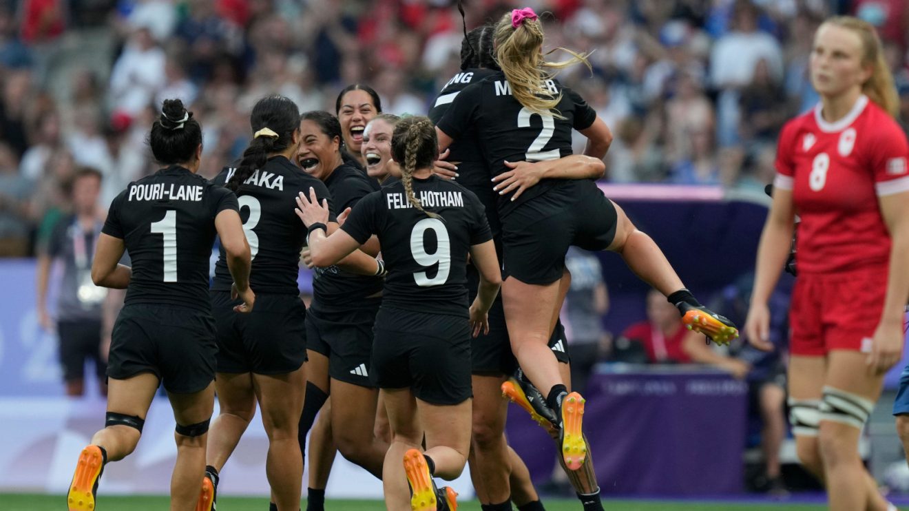 New Zealand celebrate victory over Canada as they claim the Gold medal.
