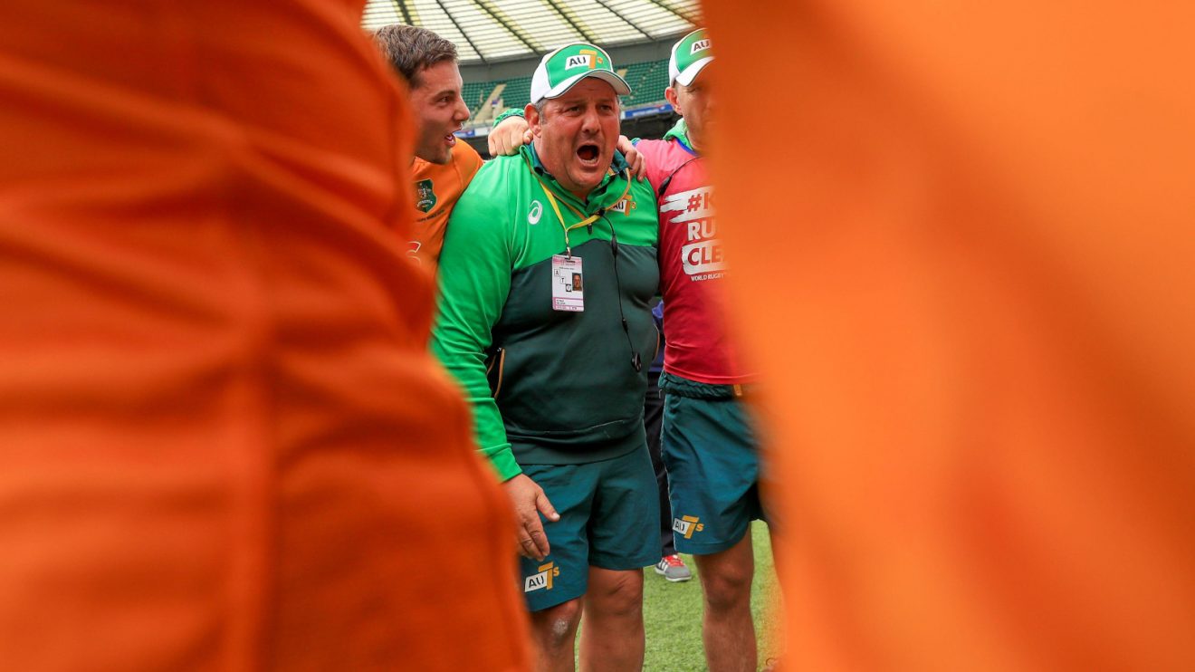 Australia Sevens head coach John Manenti in huddle.