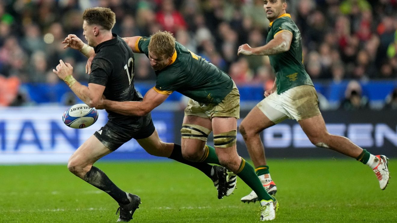 Pieter-Steph du Toit tackles Jordie Barrett.