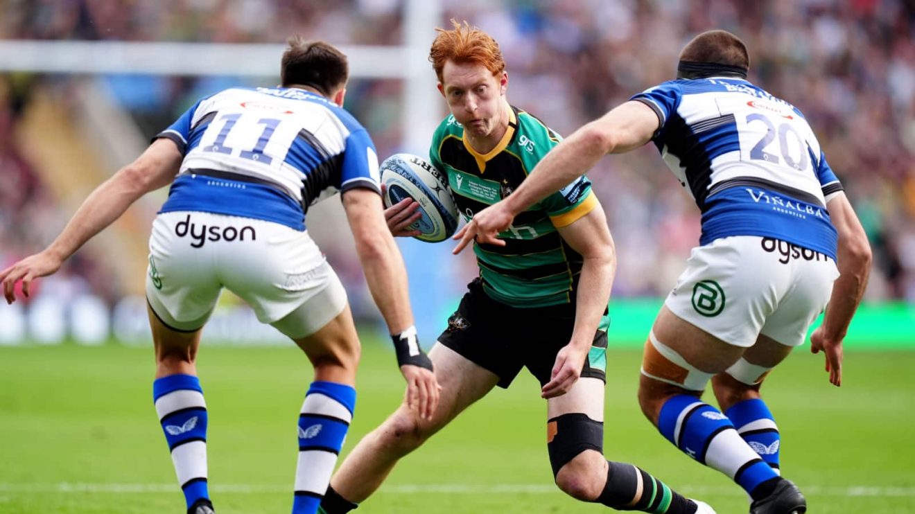 Northampton Saints' George Hendy (centre) is tackled by Bath Rugby's Will Muir (left) and Josh Bayliss (right) during the Gallagher Premiership final at Twickenham Stadium, London.