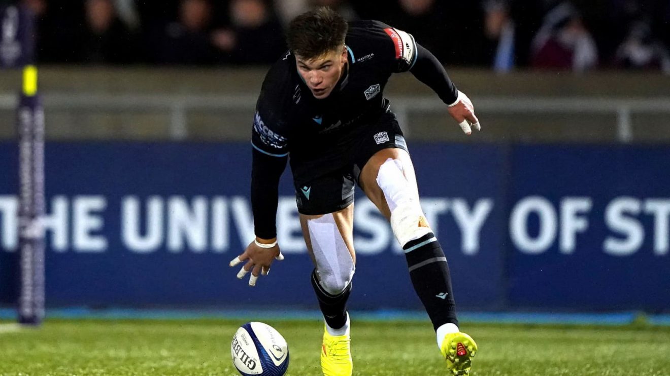 Huw Jones scoring a try for Glasgow Warriors in 2024.