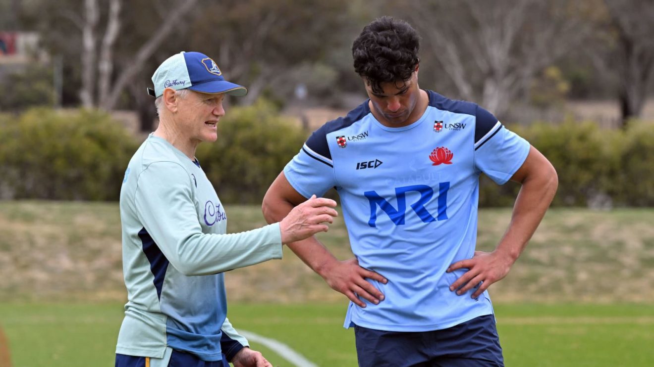 Joseph Suaalii and Joe Schmidt chatting during training session in 2024.