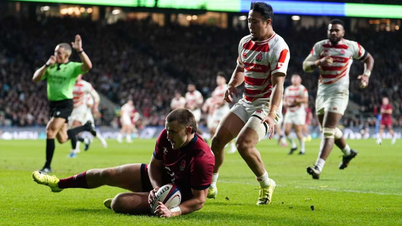 England's Ollie Sleightholme scores against Japan.