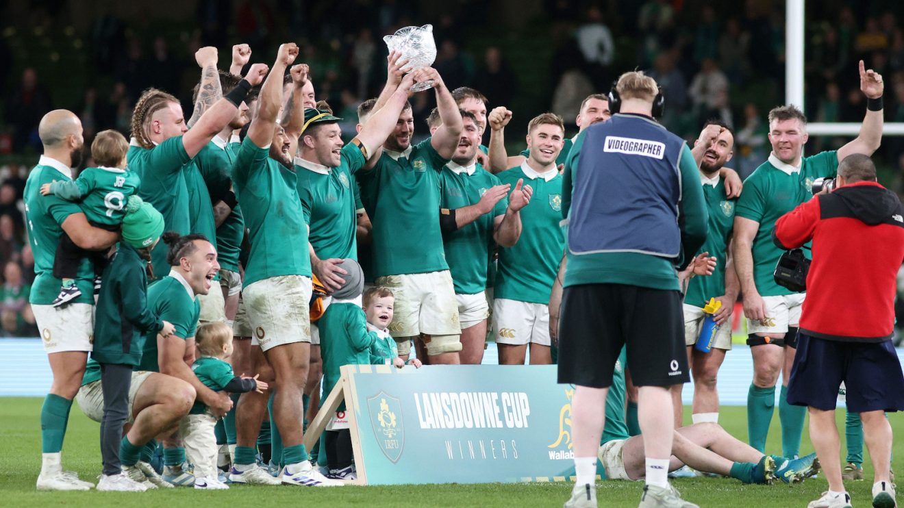 Ireland players lift the Lansdowne Cup after win over Australia.
