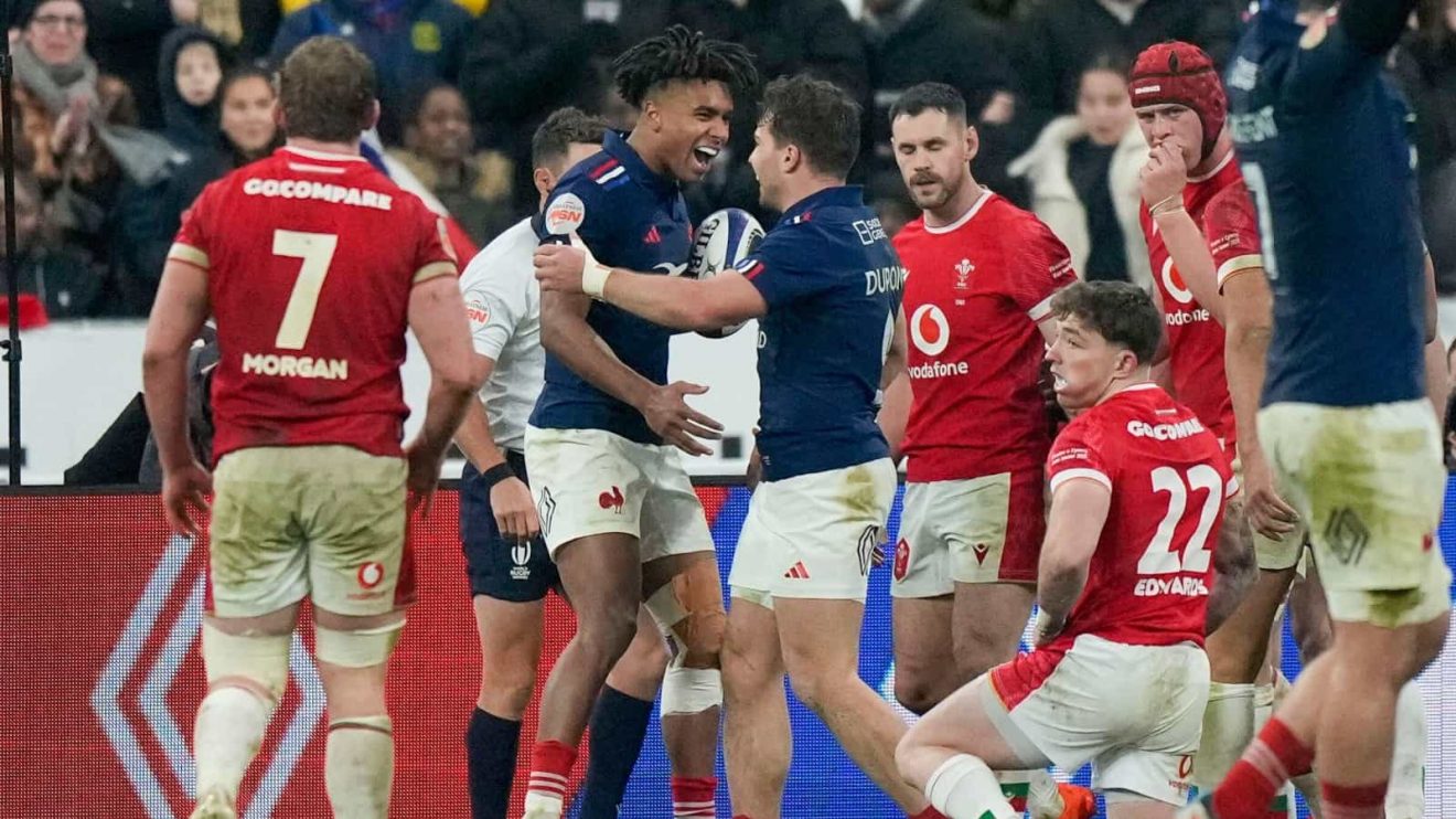 Antoine Dupont celebrates Theo Attissogbe try for France against Wales in the 2025 Six Nations.