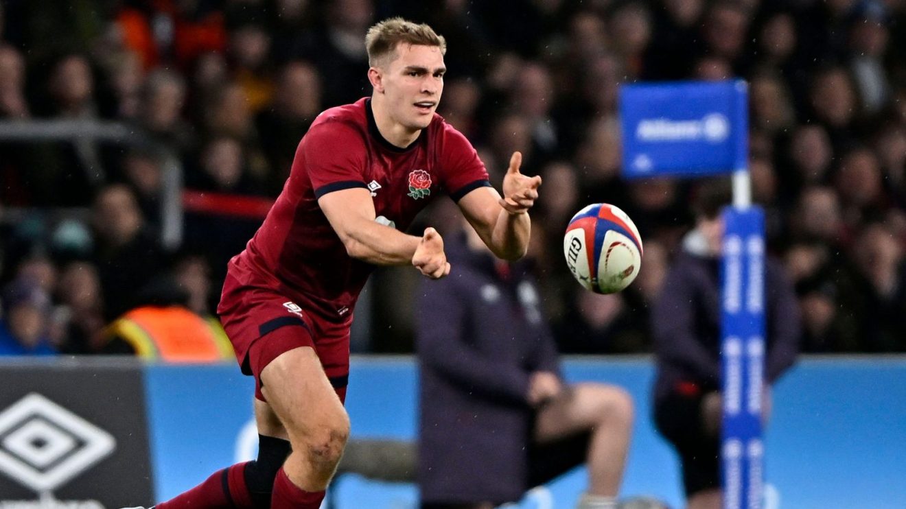 England scrum-half Jack van Poortvliet passes a ball in a Test match against Japan