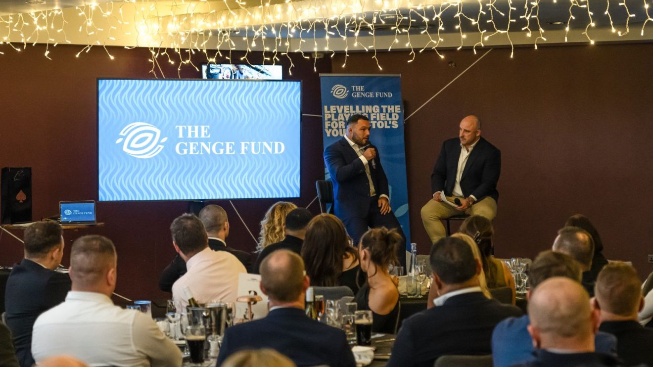 Ellis Genge speaking at a charity fundraiser