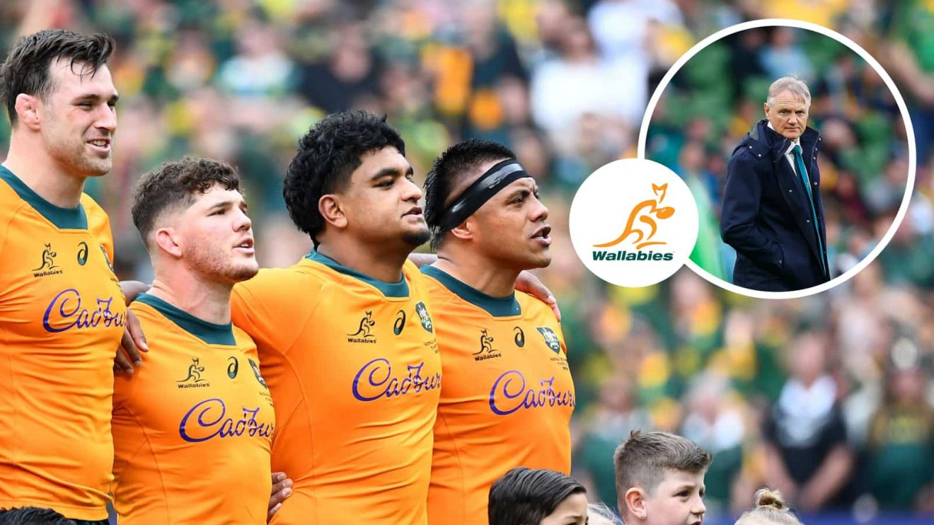 The Wallabies stand for the Australian anthem and an insert of head coach Joe Schmidt.