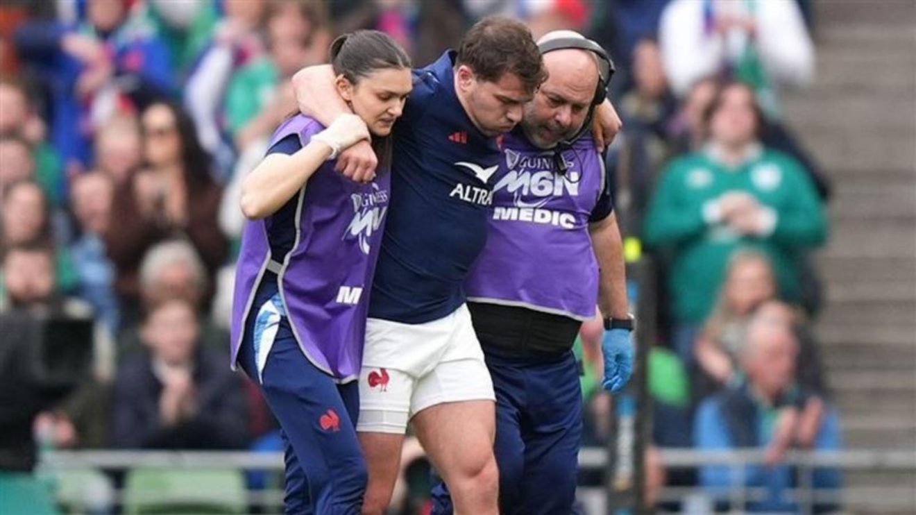 Antoine Dupont being carried off the field in 2025 Six Nations Test v Ireland