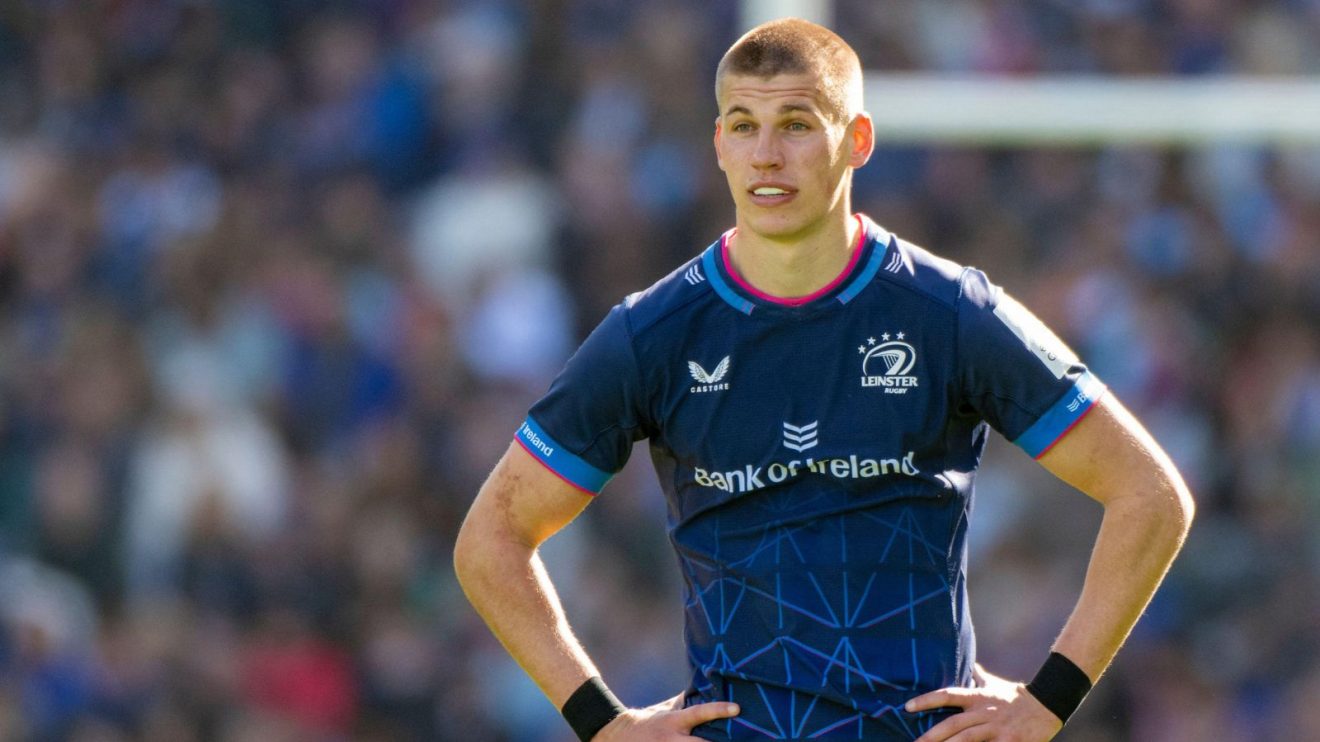Sam Prendergast talking to a team mate in Leinster's 62-0 win over Harlequins