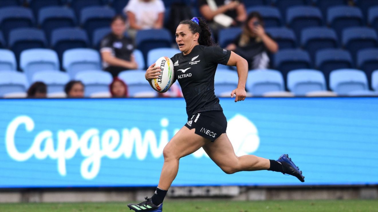 Portia Woodman-Wickliffe carrying the ball at the Stade de France during the 2024 Olympic Games