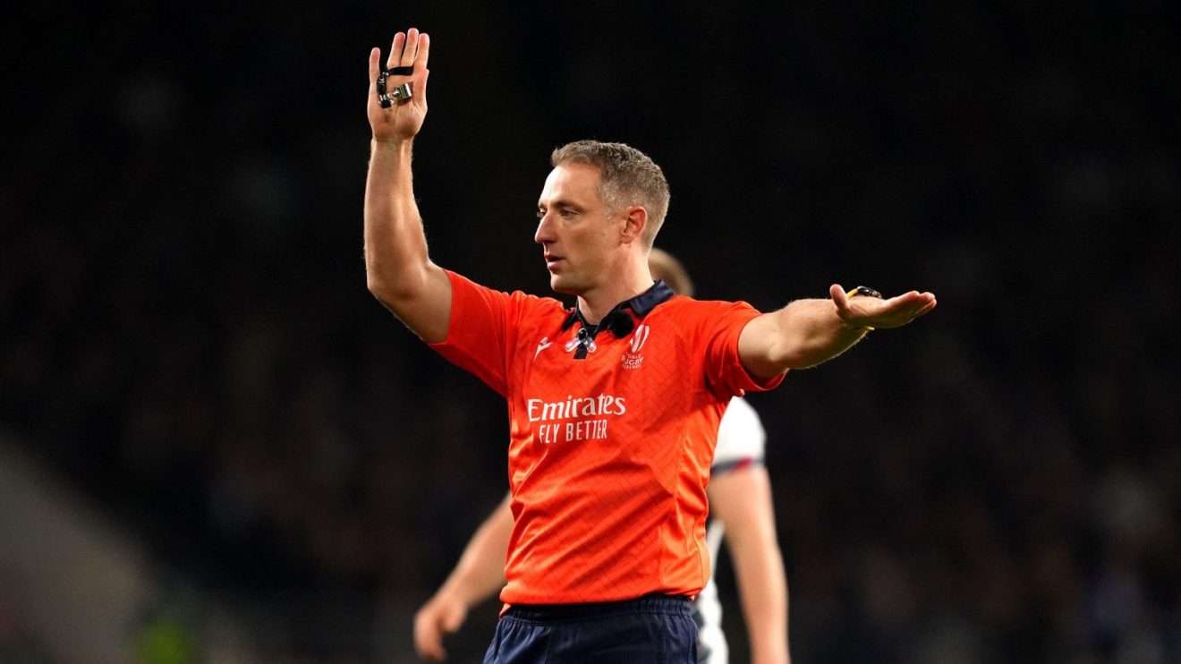 Referee Andrew Brace awarding a scrum during a Test match in 2024