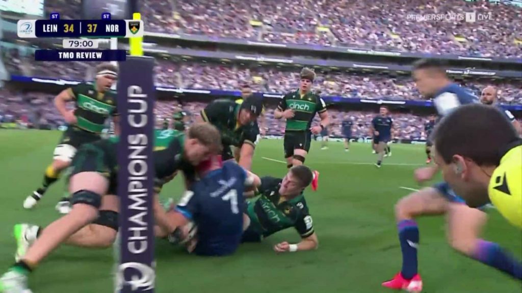 Alex Coles rips the ball from Josh van der Flier