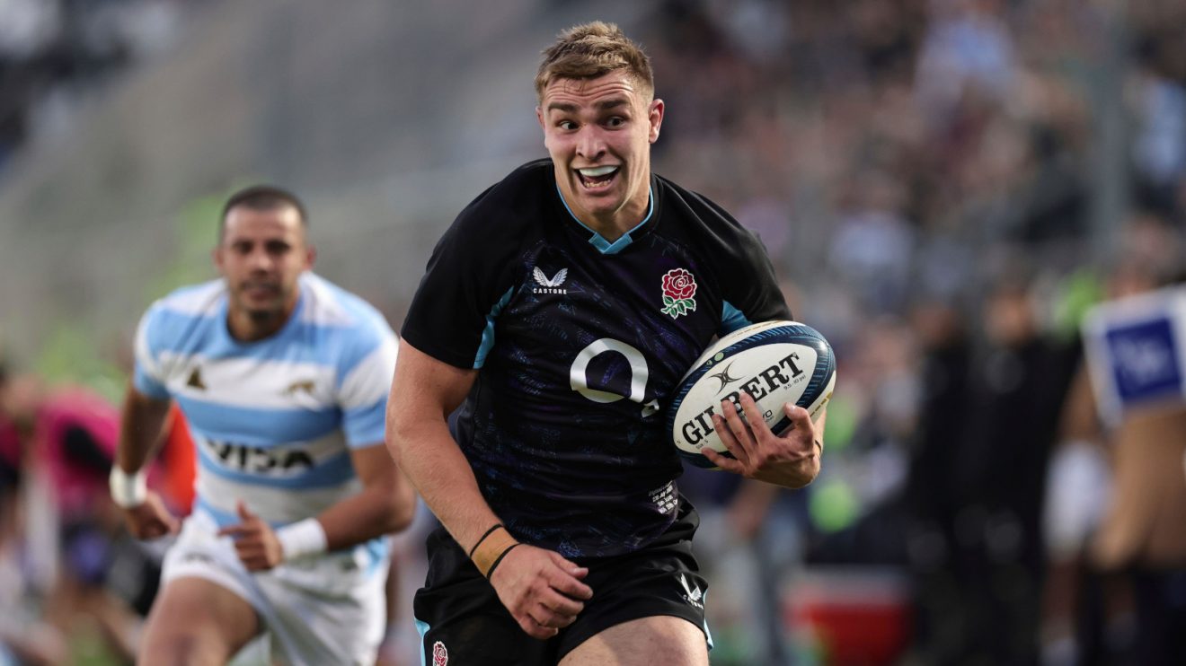 Jack van Poortvliet on his way to scoring a try for England against Argentina.
