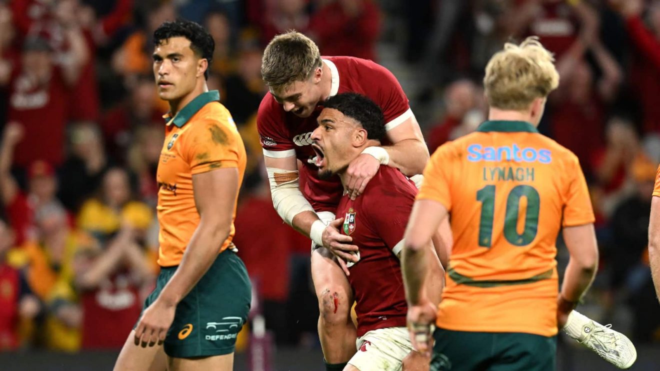 Sione Tuipulotu of the Lions celebrates scoring a try with team mates during the First Test match between the Wallabies and the British and Irish Lions