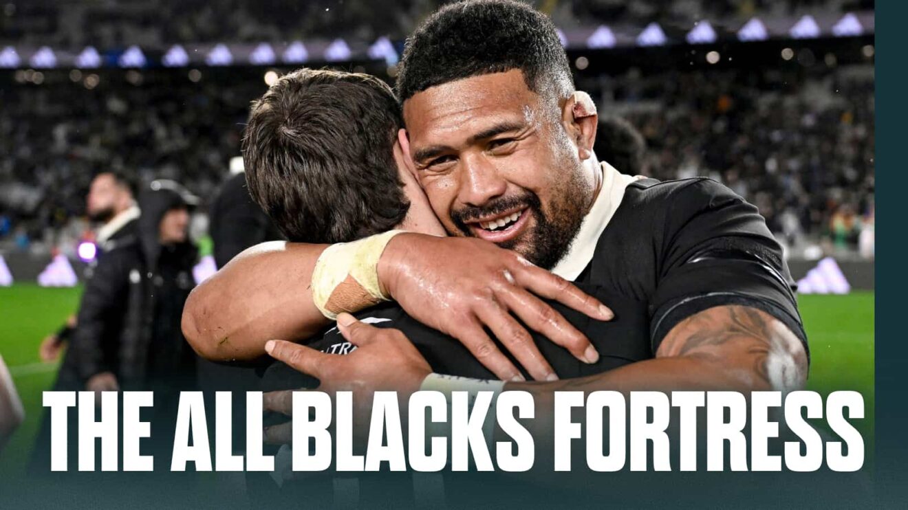 All Blacks' Ardie Savea embraces teammate Kyle Preston with the words "The All Blacks Fortress"