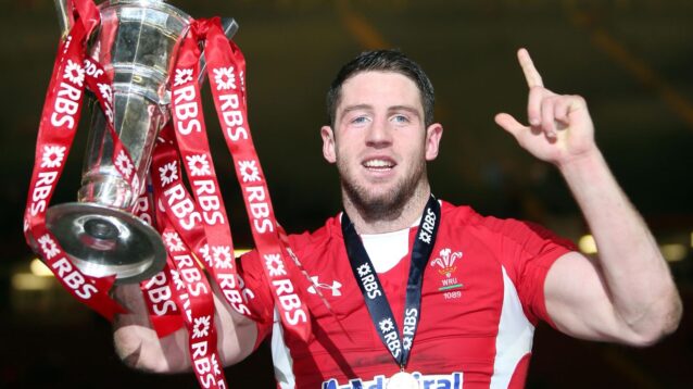Alex Cuthbert holding up the Six Nations trophy