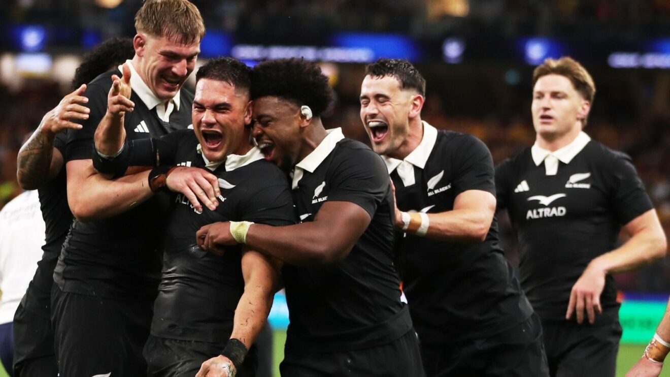 All Blacks players celebrate Quinn Tupaea's second try v Australia in the 2025 Rugby Championship