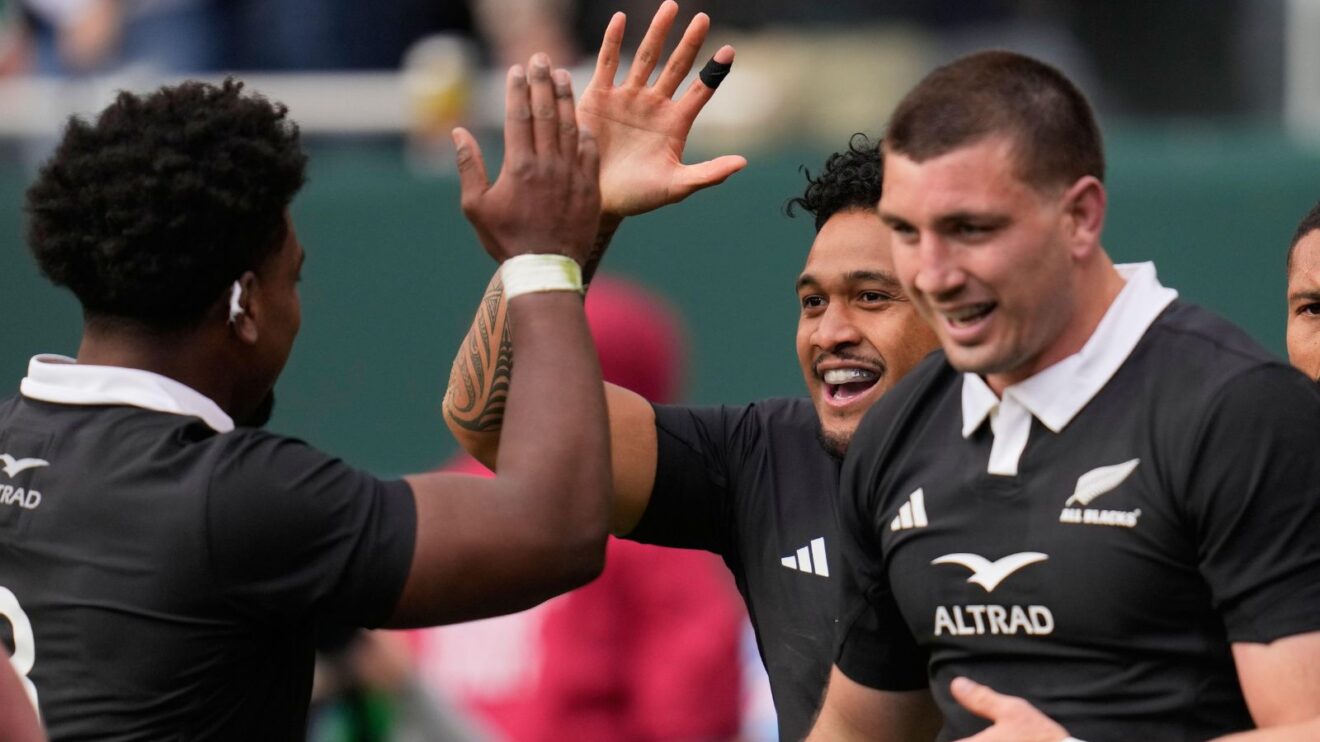 All Blacks players celebrating a try v Ireland in 2025