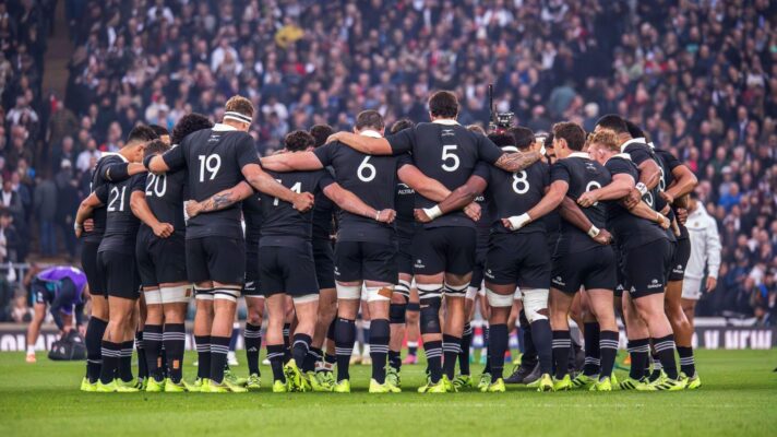 All Blacks players in a huddle