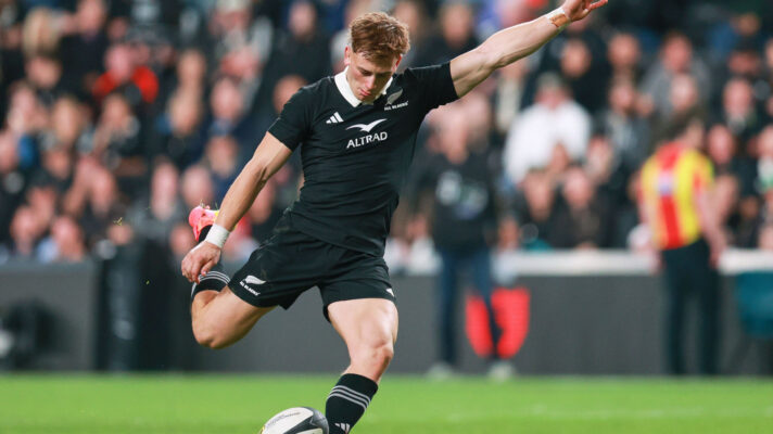 All Blacks fly-half Ruben Love kicking at goal.