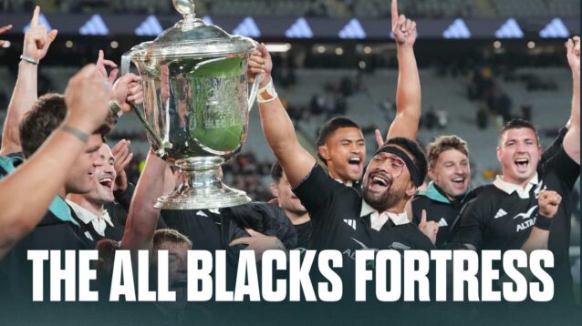 All Blacks captain Ardie Savea holds the Bledisloe Cup trophy aloft after defeating Australia at Eden Park in Auckland