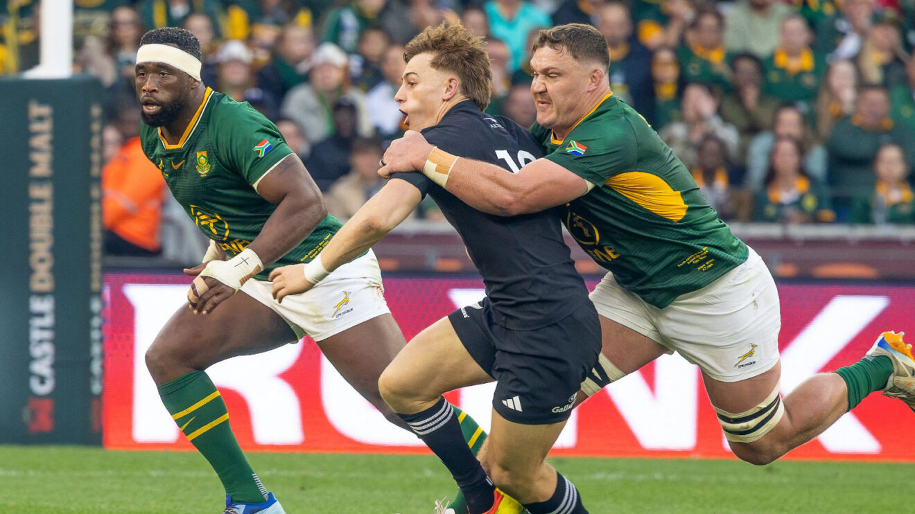 Ruben Love tackled by Jasper Wiese in Springboks v All Blacks Test.