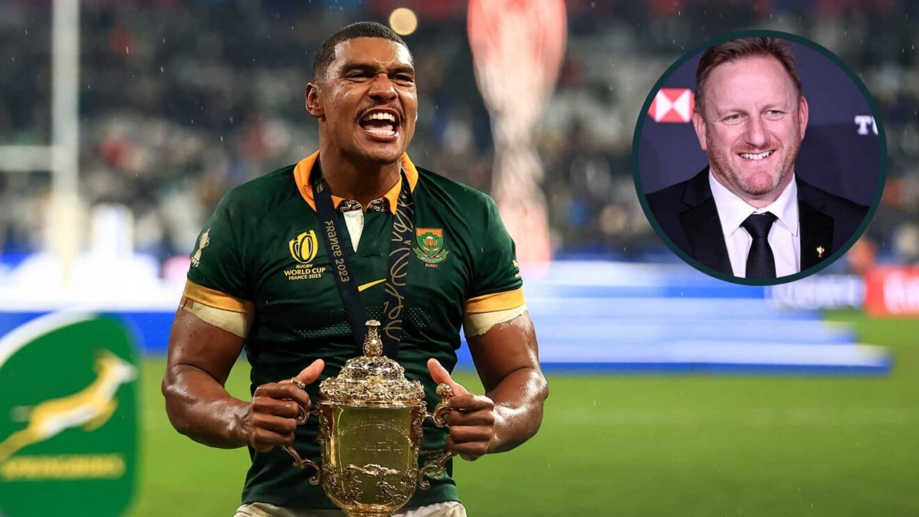 Springboks full-back Damian Willemse holds the William Webb Ellis trophy and an inset of World Rugby CEO Alan Gilpin.