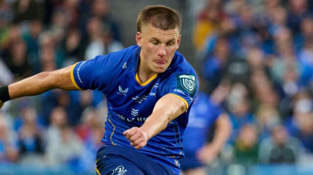 Leinster fly-half Sam Prendergast kicking.